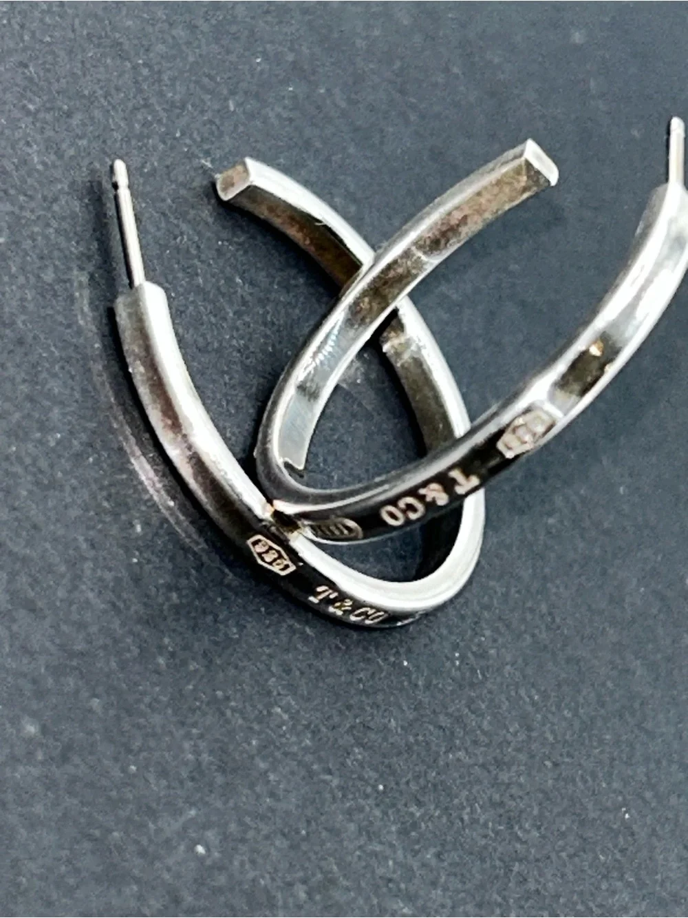 Tiffany & Co. Polished Silver Curved Hoop Earrings